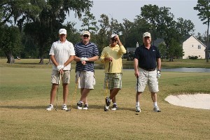 Attendees participate in the chapter's October golf tournament, which contributes to the education fund.